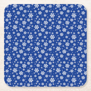 Witte sneeuwvlokken op donkerblauw winterpatroon kartonnen onderzetters