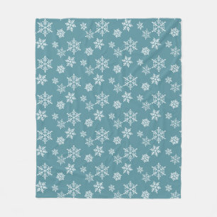 Witte sneeuwvlokken op een turquoise vliesdeken fleece deken