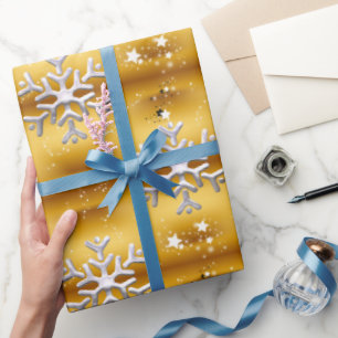 Witte sneeuwvlokken op gouden kerst cadeaupapier