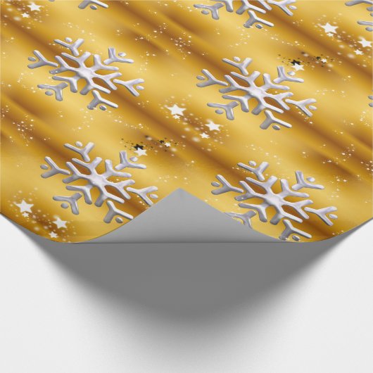 Witte sneeuwvlokken op gouden kerst cadeaupapier (Hoek)