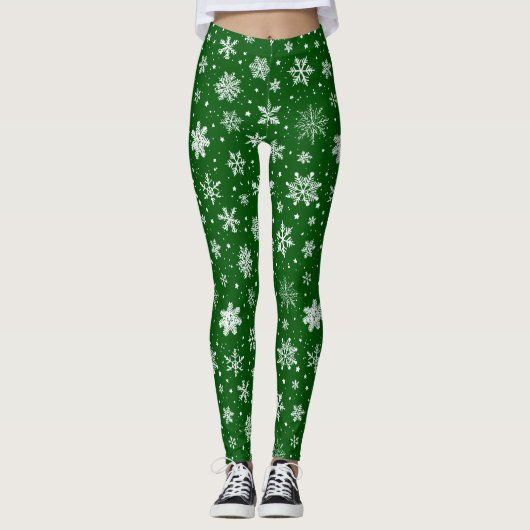Witte sneeuwvlokken op groen leggings (Voorkant)