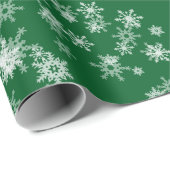 Witte sneeuwvlokken op groenboek cadeaupapier (Rol Hoek)