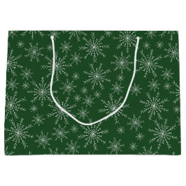 Witte sneeuwvlokken op groene vakantie groot cadeauzakje