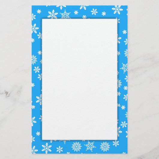 Witte sneeuwvlokken op lichtblauwe achtergrond briefpapier (Voorkant)