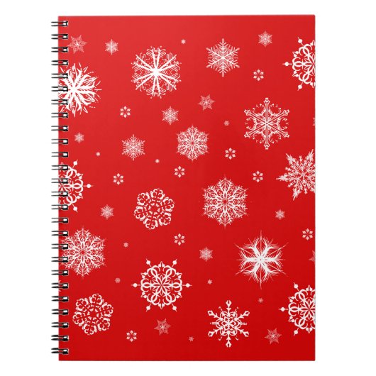 Witte sneeuwvlokken op rode achtergrond notitieboek (Voorkant)