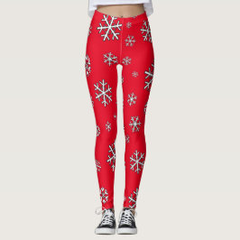Witte sneeuwvlokken op rood leggings