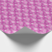 witte sneeuwvlokken op roze cadeaupapier (Hoek)