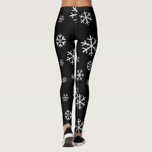 Witte sneeuwvlokken op zwart leggings (Achterkant)