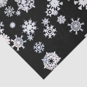 Witte sneeuwvlokken op zwart papier (Detail)