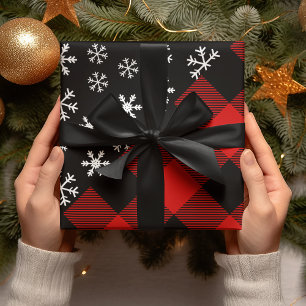 Witte sneeuwvlokken op zwarte kerstavond cadeaupapier