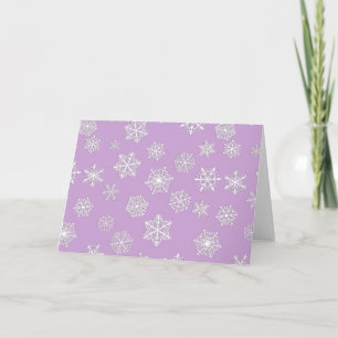 Witte sneeuwvlokken tegen zacht lavendel feestdagen kaart