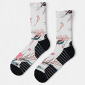 Witte sokken met een bloemendesign met roze bloeme (Links)