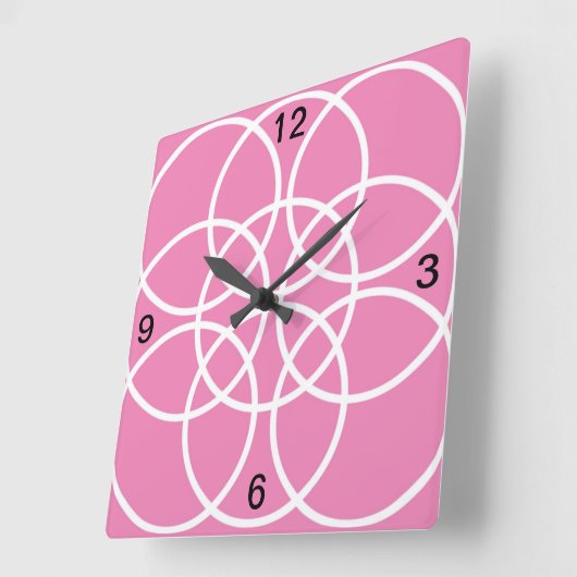 Witte spiraalvormige cirkels op roze vierkante klok (Hoek)