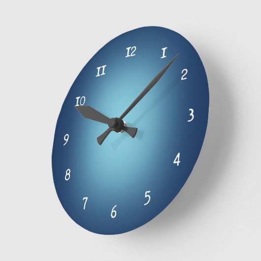 Witte spotlicht op blauw ronde klok (Hoek)