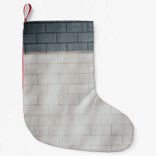 Witte steenwand kleine kerstsok