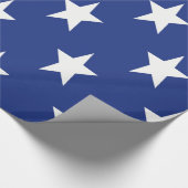 Witte ster op blauwe achtergrond cadeaupapier (Hoek)