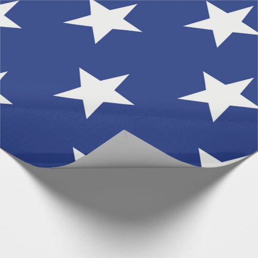 Witte ster op blauwe achtergrond cadeaupapier (Hoek)