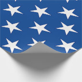 Witte sterren op blauw cadeaupapier (Hoek)