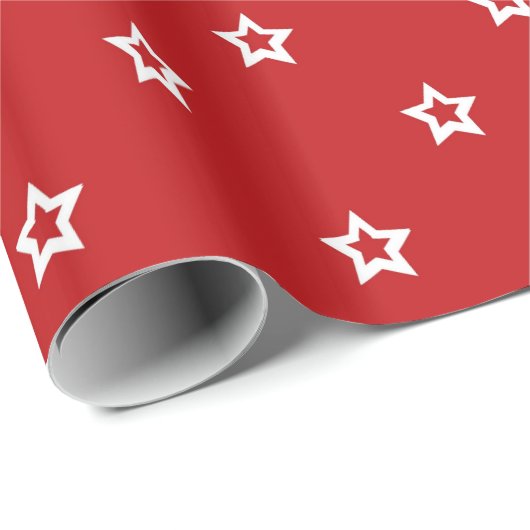 Witte sterren op helder rood cadeaupapier (Rol Hoek)