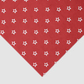 Witte sterren op helder rood tissuepapier (Detail)