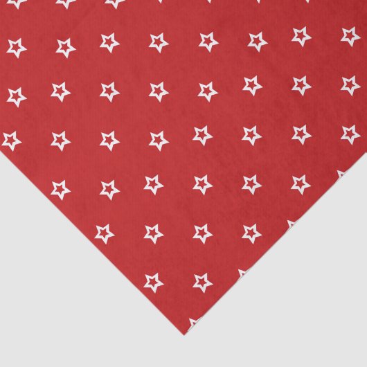 Witte sterren op helder rood tissuepapier (Detail)