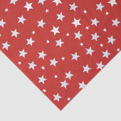 Witte sterren op rood tissuepapier (Detail)