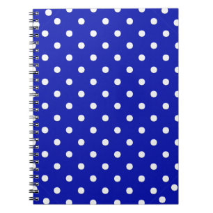 witte stippen op blauw notitieboek