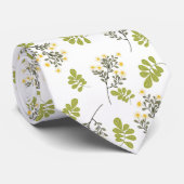 Witte stropdas met groen en geel bladpatroon (Opgerold)