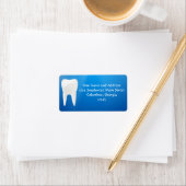 Witte tand op blauwe achtergrond etiket (Insitu)