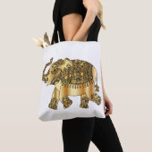 Witte tas met een gouden olifant (Dichtbij)