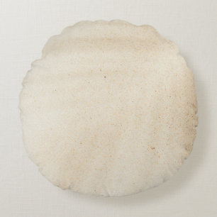 Witte textiel met zwarte schaduw rond kussen