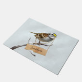 Witte trommels passen de familienaam aan deurmat (Schuin)