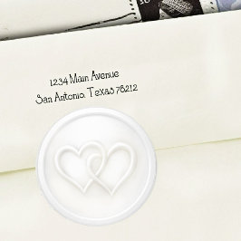 Witte trouwring met twee verstrengelde harten ronde sticker