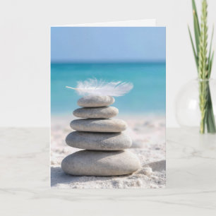 Witte Veer op een Strandstenen Stapeltje met Citaa Kaart