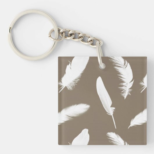 Witte veerafdruk op taupe sleutelhanger (Voorkant)