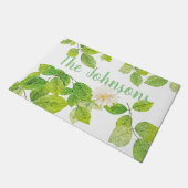 Witte ventilator en groene lederen tuin deurmat (Schuin)