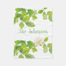 Witte ventilator en groene lederen tuin fleece deken