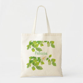 Witte ventilator en groene lederen tuin tote bag