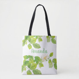 Witte ventilator en groene lederen tuin tote bag