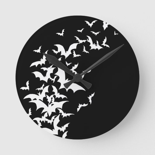 Witte vlekken op zwart ronde klok (Voorkant)