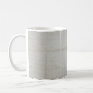 Witte wandtegels koffiemok