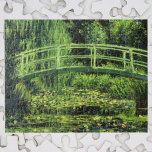 Witte waterlionen van Claude Monet,  kunst Legpuzzel<br><div class="desc">White Waterlilies (1899) van Claude Monet is een impressionist fijn kunstschilderij met florale natuur. Het is een van de vele variaties van de waterlelies en de Japanse voetbrugschilderijen die Monet schilderde in zijn bloemtuin in het voorjaar in Giverny, Frankrijk. Een voetgangersbrug over een vijver in groene tinten. Over de kunstenaar:...</div>