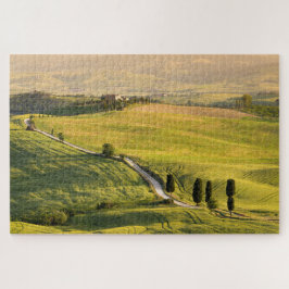 Witte weg in een Toscaans landschap bij zonsopgang Legpuzzel