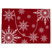 Witte wintersneeuwvlokken op rode Prettige feestda Groot Cadeauzakje (Achterkant)