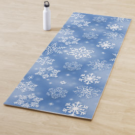 Witte wintervlokken op ijzig blauw yogamat