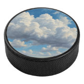 Witte wolken en heldere blauwe lucht hockey puck (3/4)