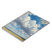 Witte wolken en heldere blauwe lucht notitieboek (Linkerzijde)