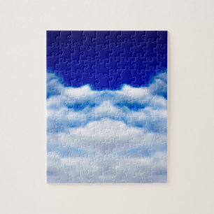 Witte wolkengezicht tegen een blauwe hemel legpuzzel