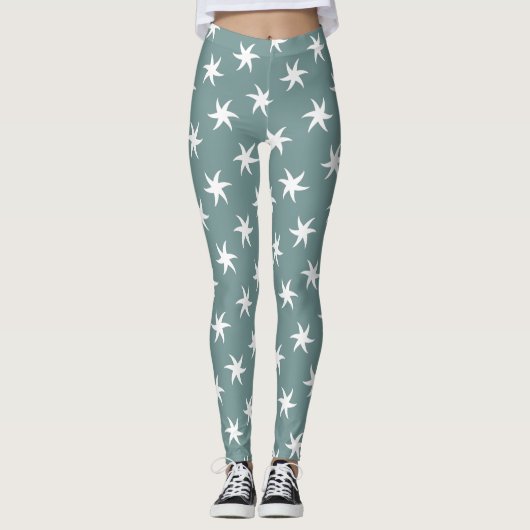 Witte zeester op strand blauw leggings (Voorkant)