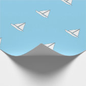 Witte zeilboten op blauwe achtergrond cadeaupapier (Hoek)